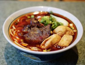 Spicy Noodle Soup with Braised Beef and Tofu Puffs